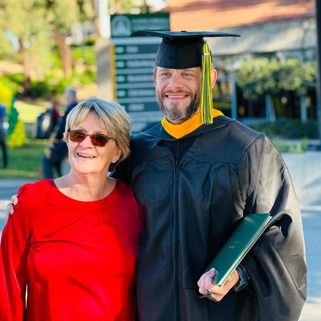 Nick and his mom at graduation